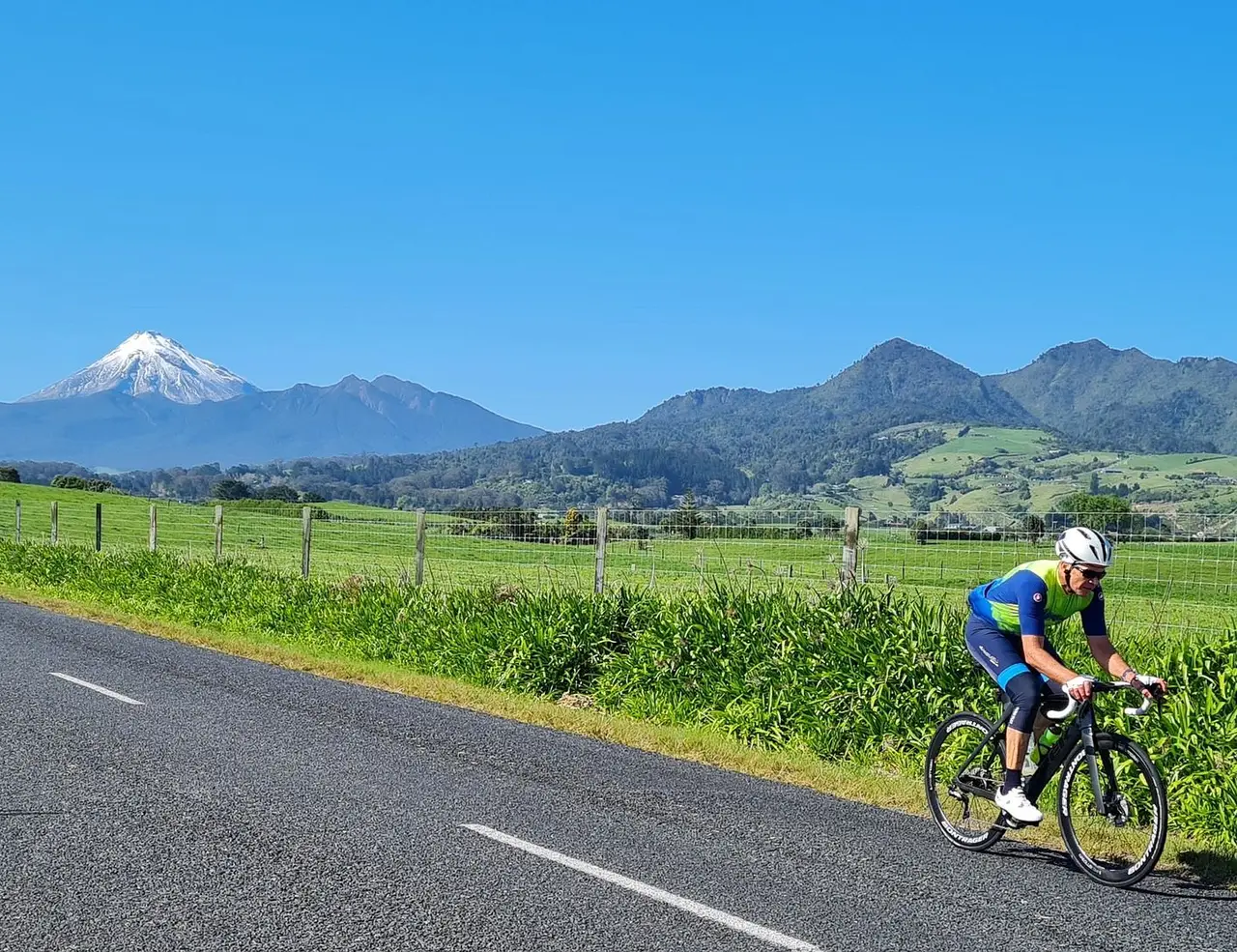 Group cyclists navigating a city loop route through Nelson streets